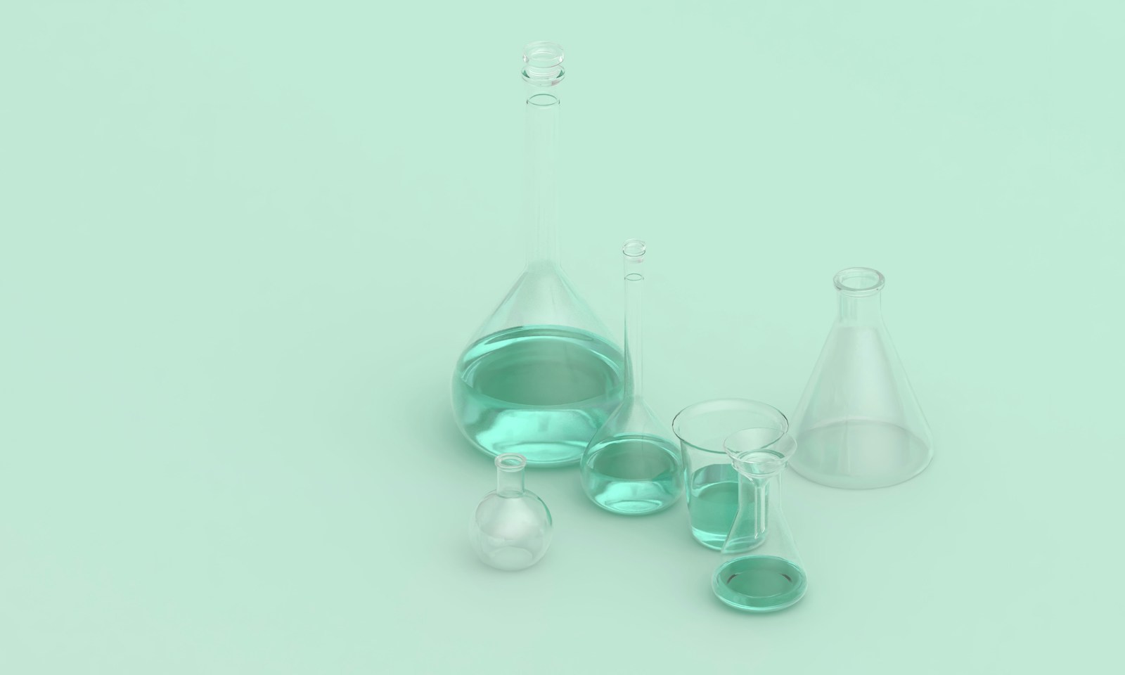 Gowned operator inspecting a filled bottle during quality control