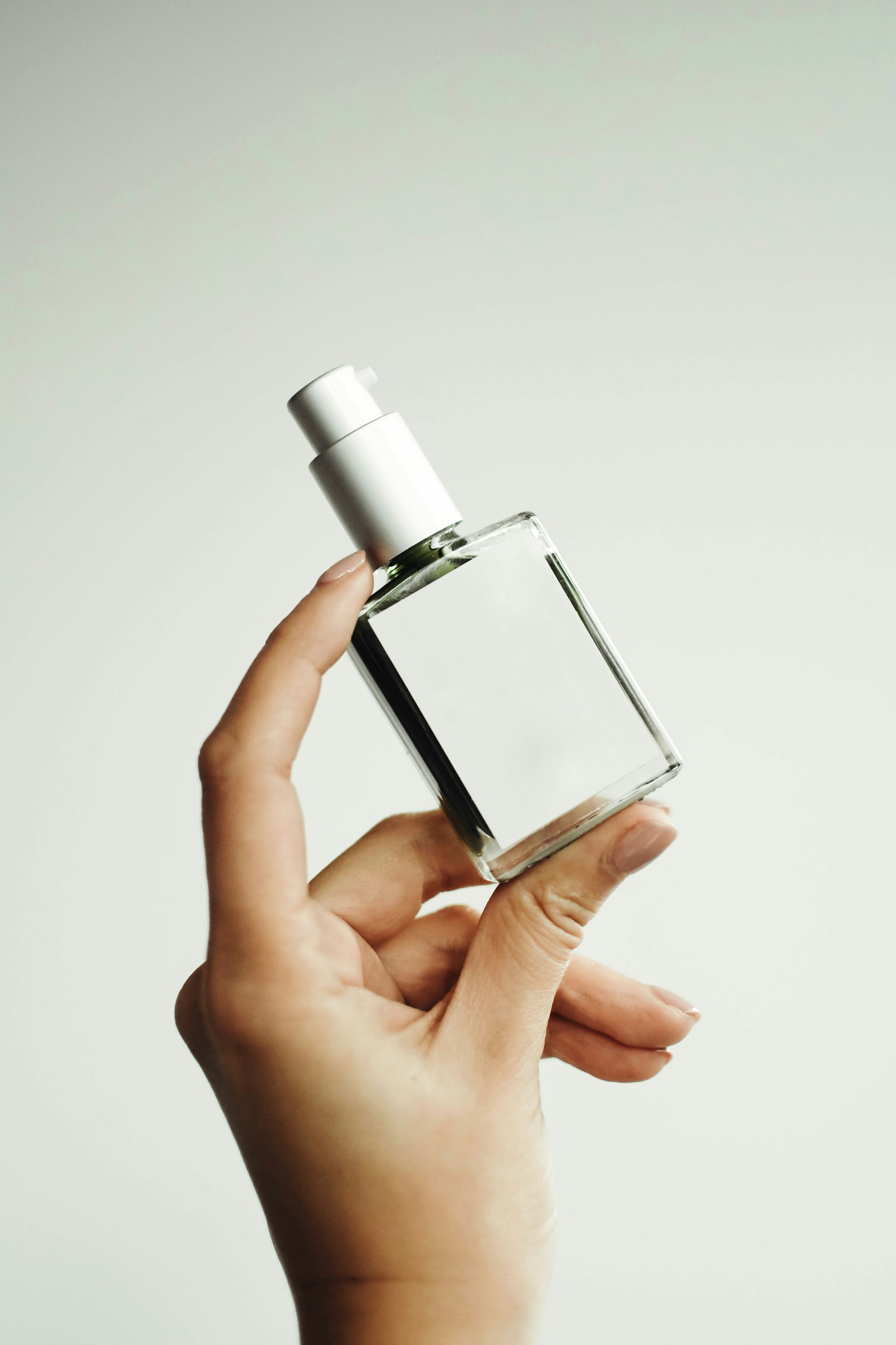 Unlabelled perfume flacons in a row, ready for private label decoration