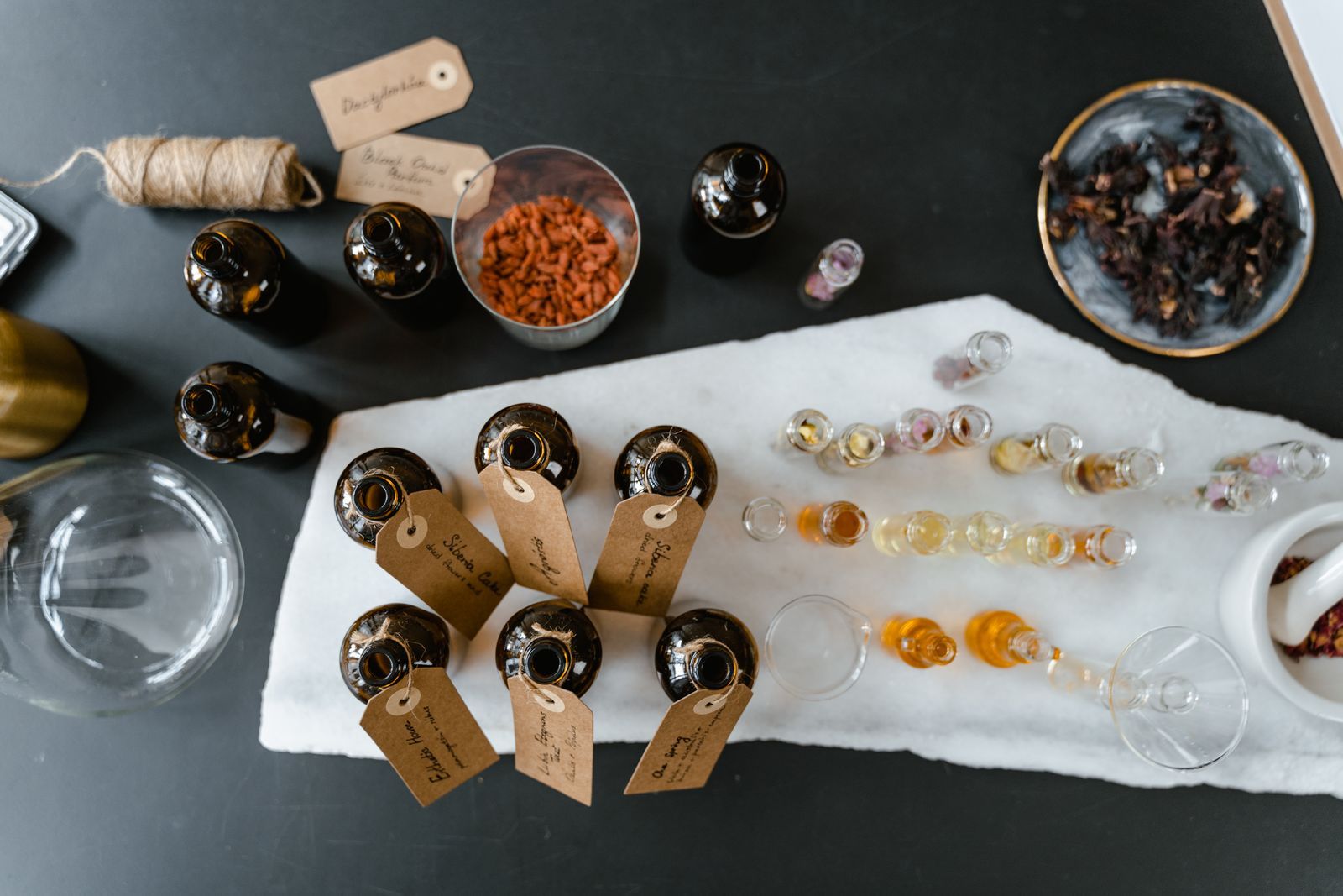 Perfume raw materials and labelled sample bottles
